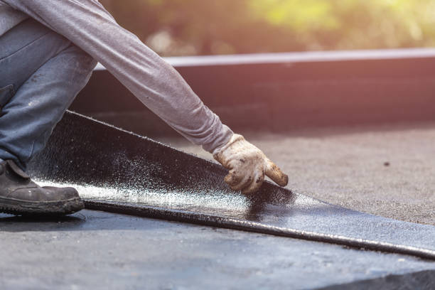 Professional Emergency Waterproofing technician working in Deer Lodge, TN